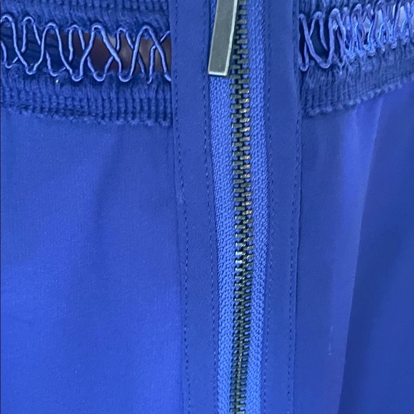 Beautiful rich purple top with embroidered detailing. - Picture 8 of 14